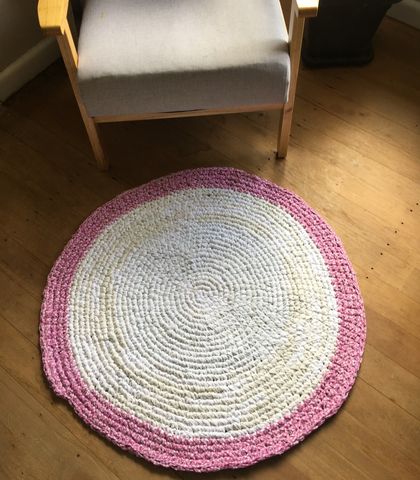 Pink and white rug